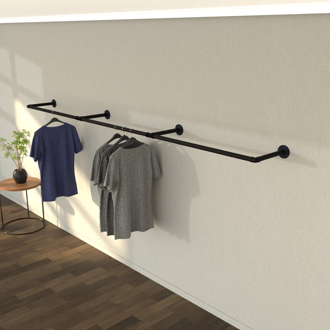 WallWear wall-mounted clothes rail, offering a clean and modern display for garments.