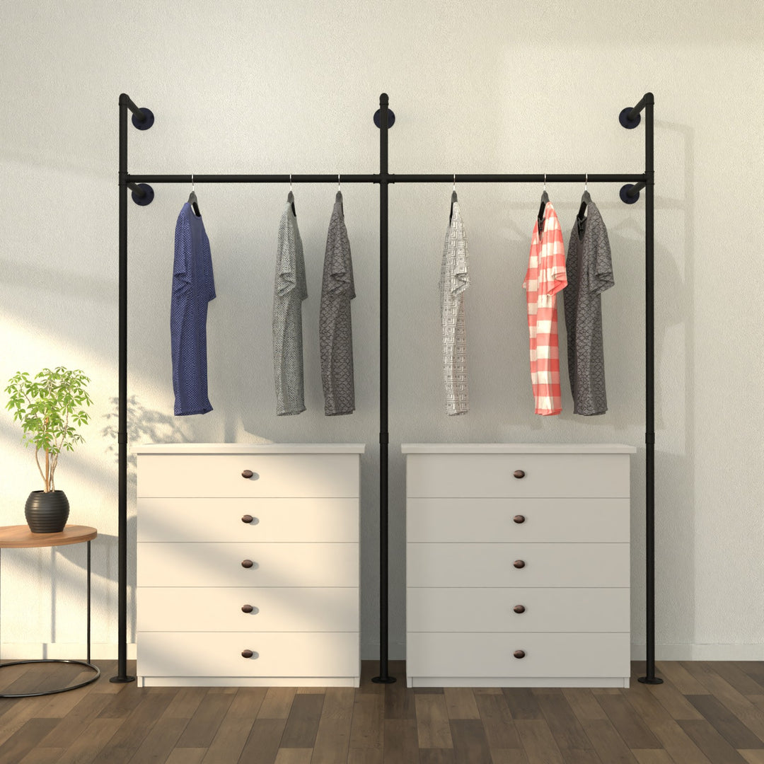 Wallish wall-mounted clothes rack with a minimalist, stylish design.