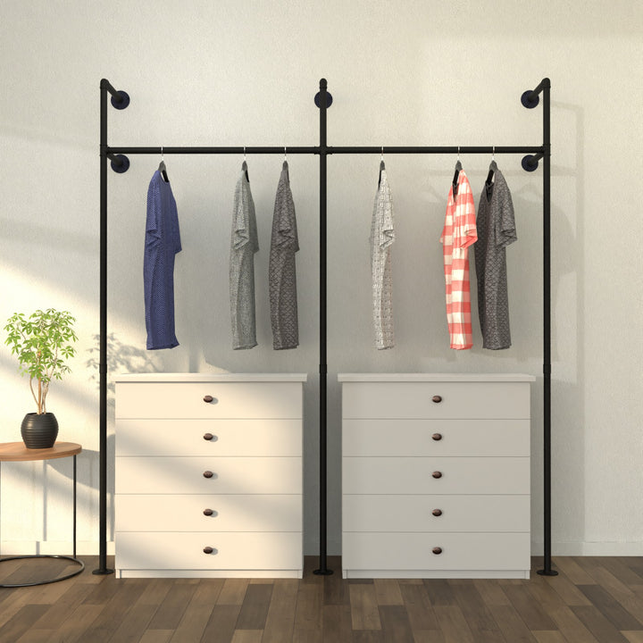 Wallish wall-mounted clothes rack with a minimalist, stylish design.