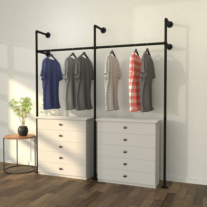 Wallish wall-mounted clothes rack with a minimalist, stylish design.